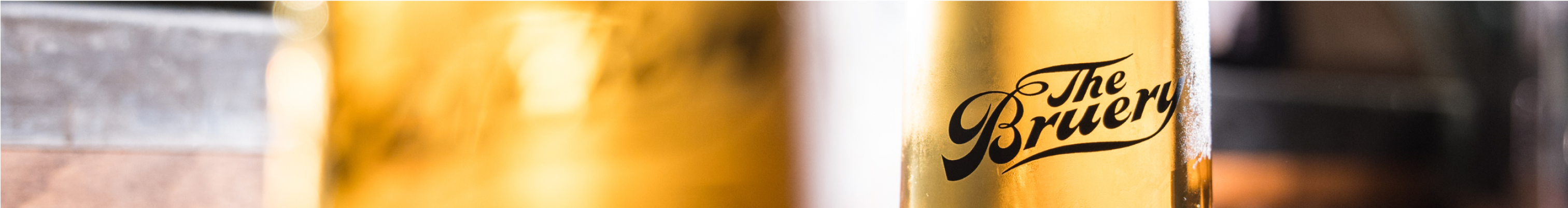 Banner image of a close-up of a Bruery branded beer glass